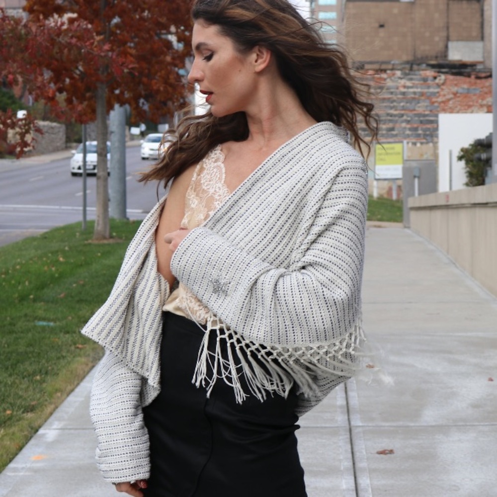 Lucia’s Sarto White and navy fringe sweater jacket with silver rhinestone stars